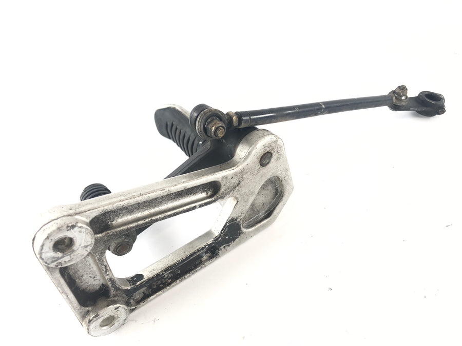 Ducati 900 SS [1992] - Footrest vlevo s nohou řidiče páky Gear