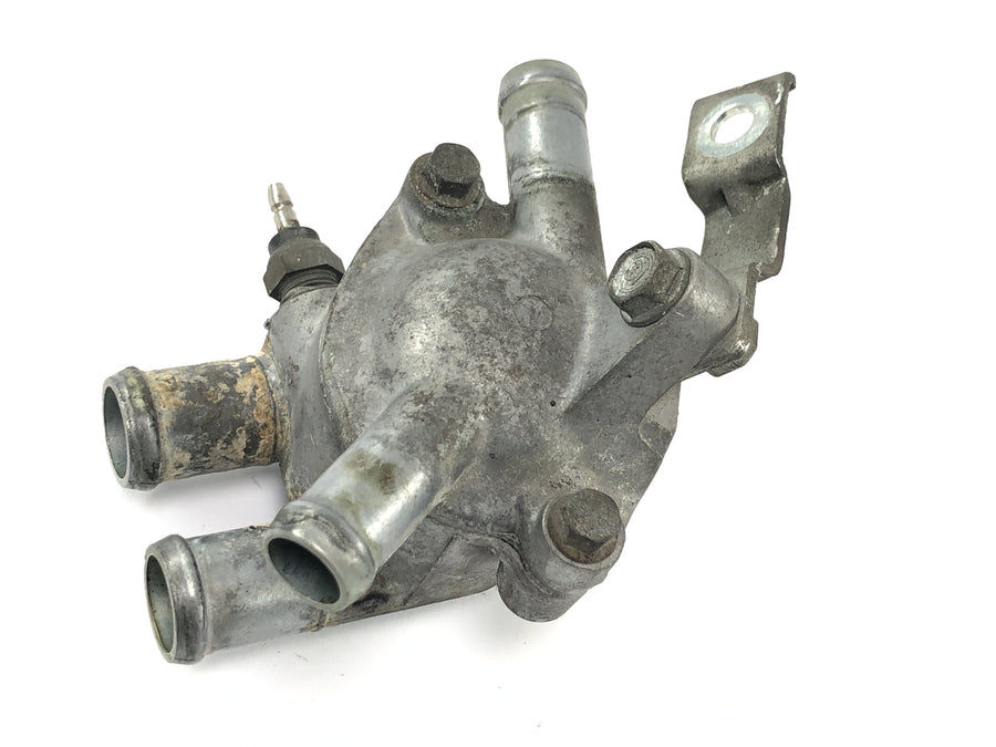 Honda XRV 750 Africa Twin RD04 [1992] - Termostat chladicí kapaliny Těleso termostatu chladicí kapaliny Rozdělovač chladicí kapaliny Rozdělovač vody
