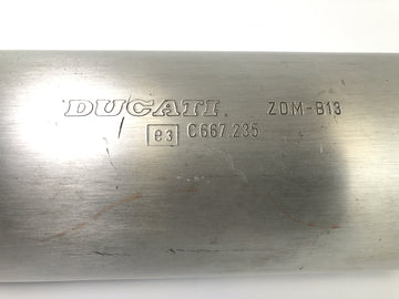 Ducati Monster M600 [1995] - tlumič tlumiče výfukových konců vlevo se známkami opotřebení - 0