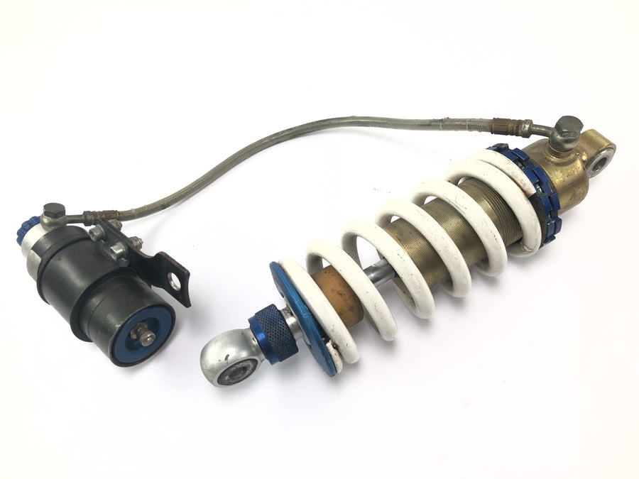 Moto Guzzi V11 Sport [1999] - Tlumič s odpruženou vzpěrou s expanzní nádrží